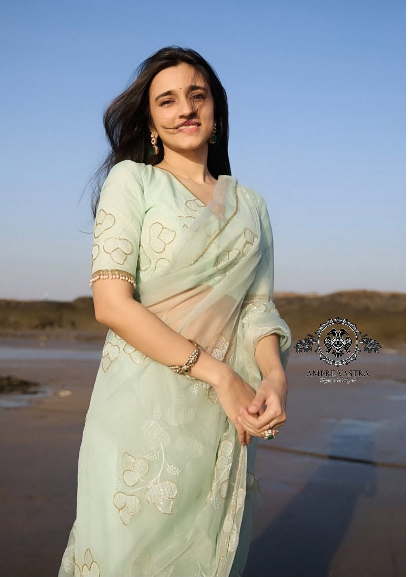 Mint Green Soft Organza Embroidered Saree with Gold Thread Work & Elegant Pearl-Trim Blouse