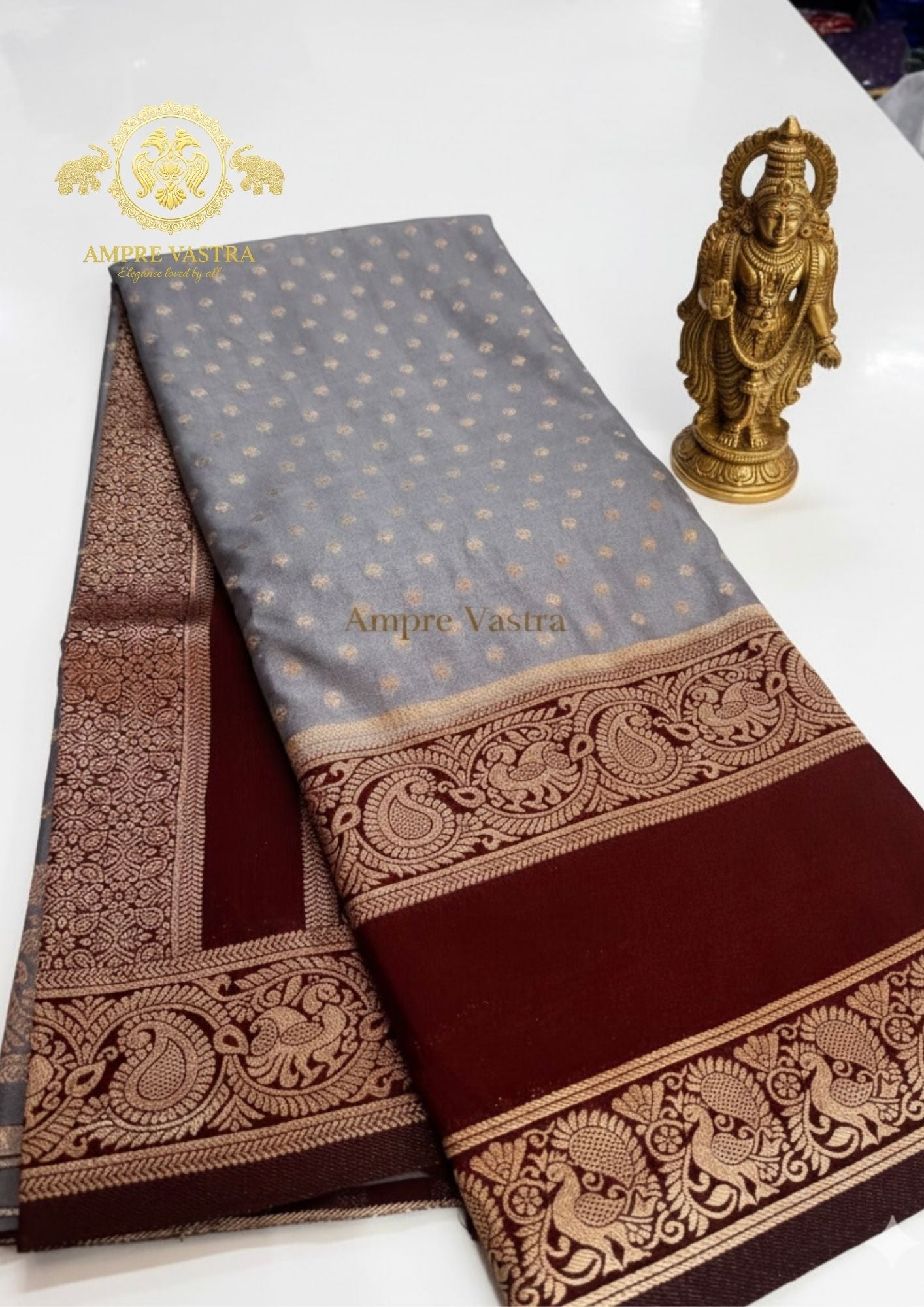 A Georgette Saree with Peacock Border, Rich Zari Pallu & Intricate Elegant Buttas