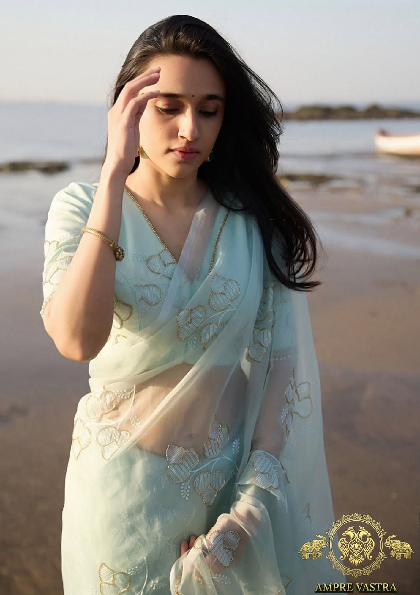 Mint Green Soft Organza Embroidered Saree with Gold Thread Work & Elegant Pearl-Trim Blouse